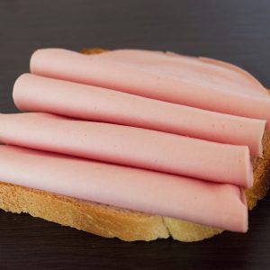 Salami sandwich. Open sandwich of salami slices on bread.